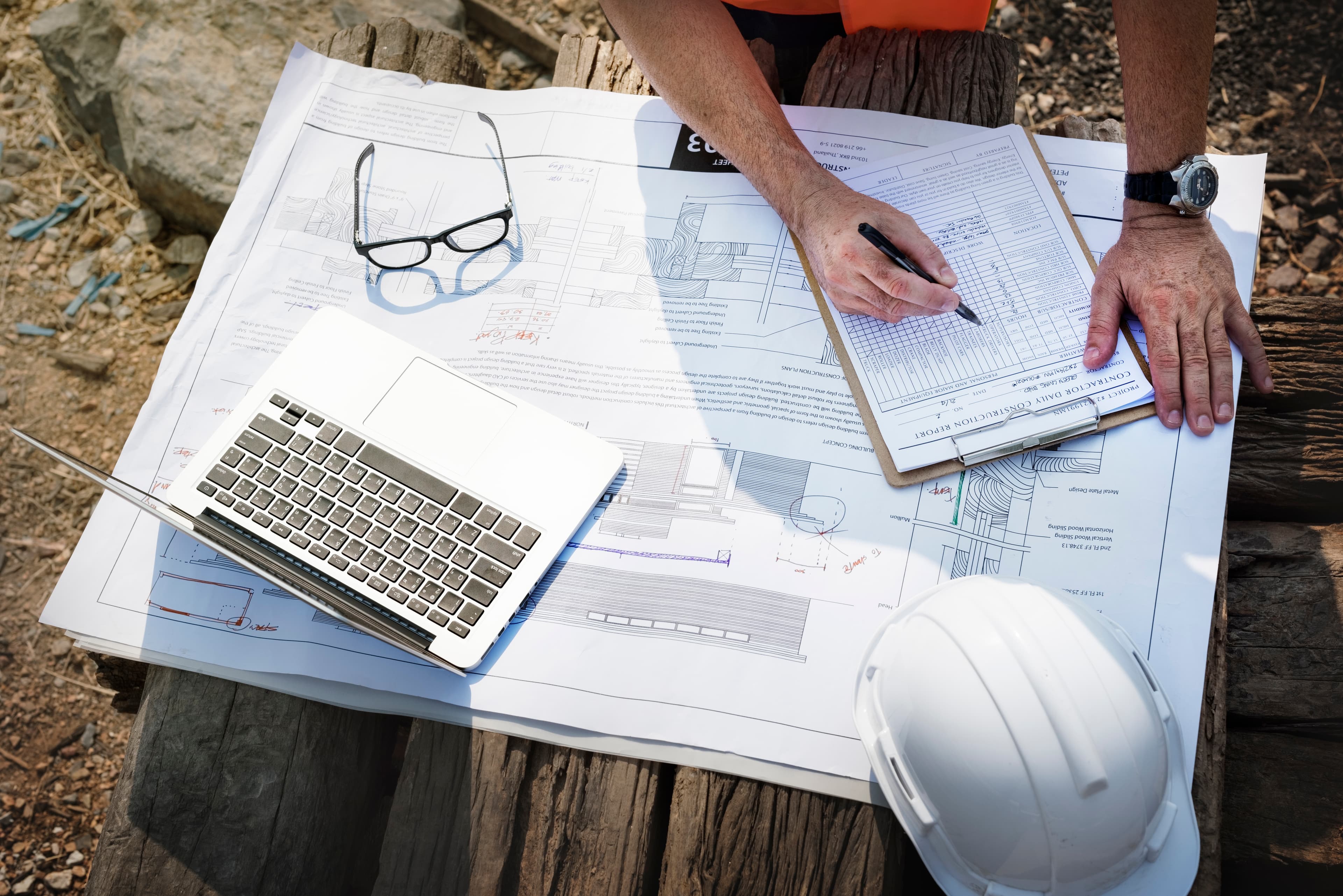 Homeowner reviewing plans for a custom home or renovation